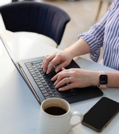 Laura Andrews hands typing